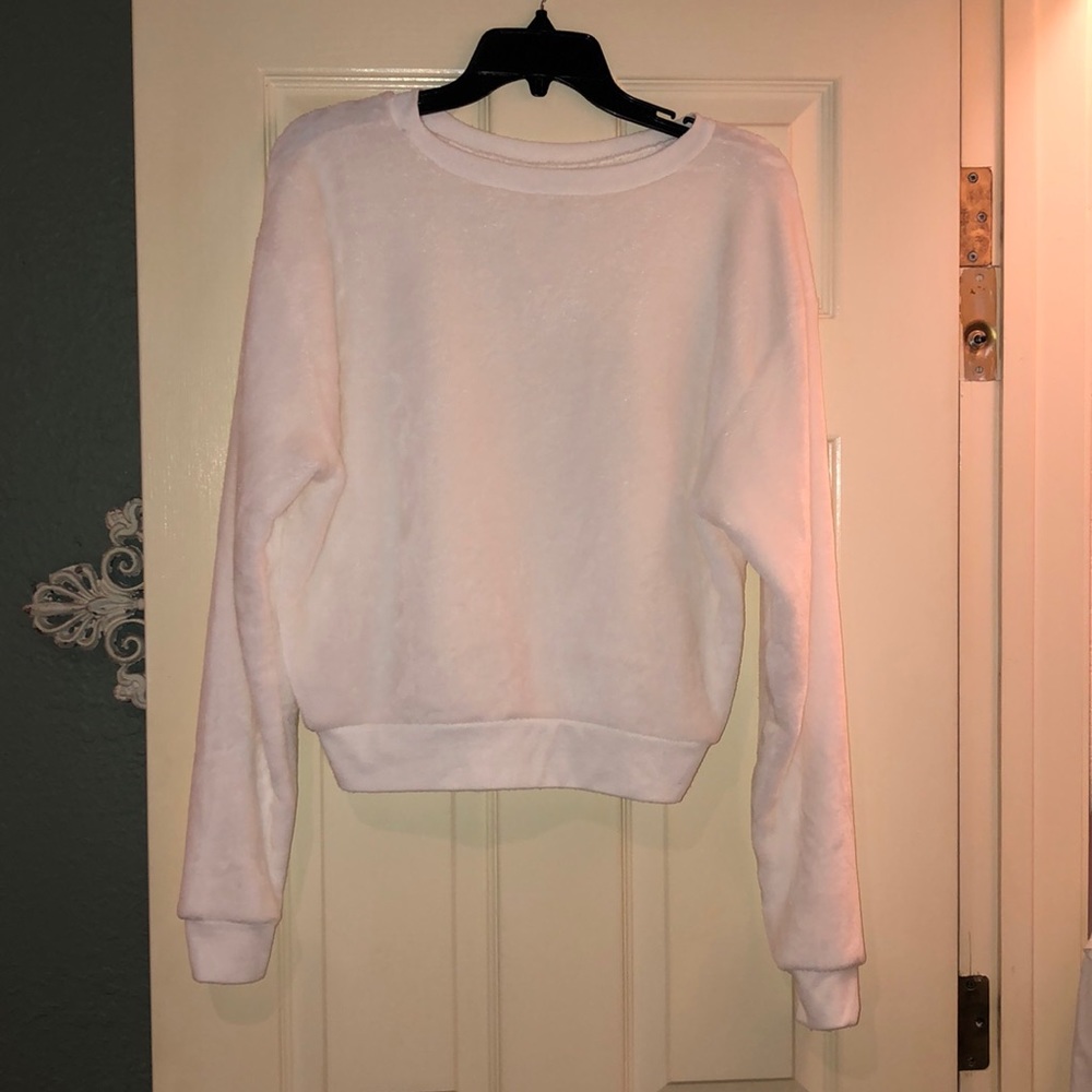 white fuzzy sweatshirt